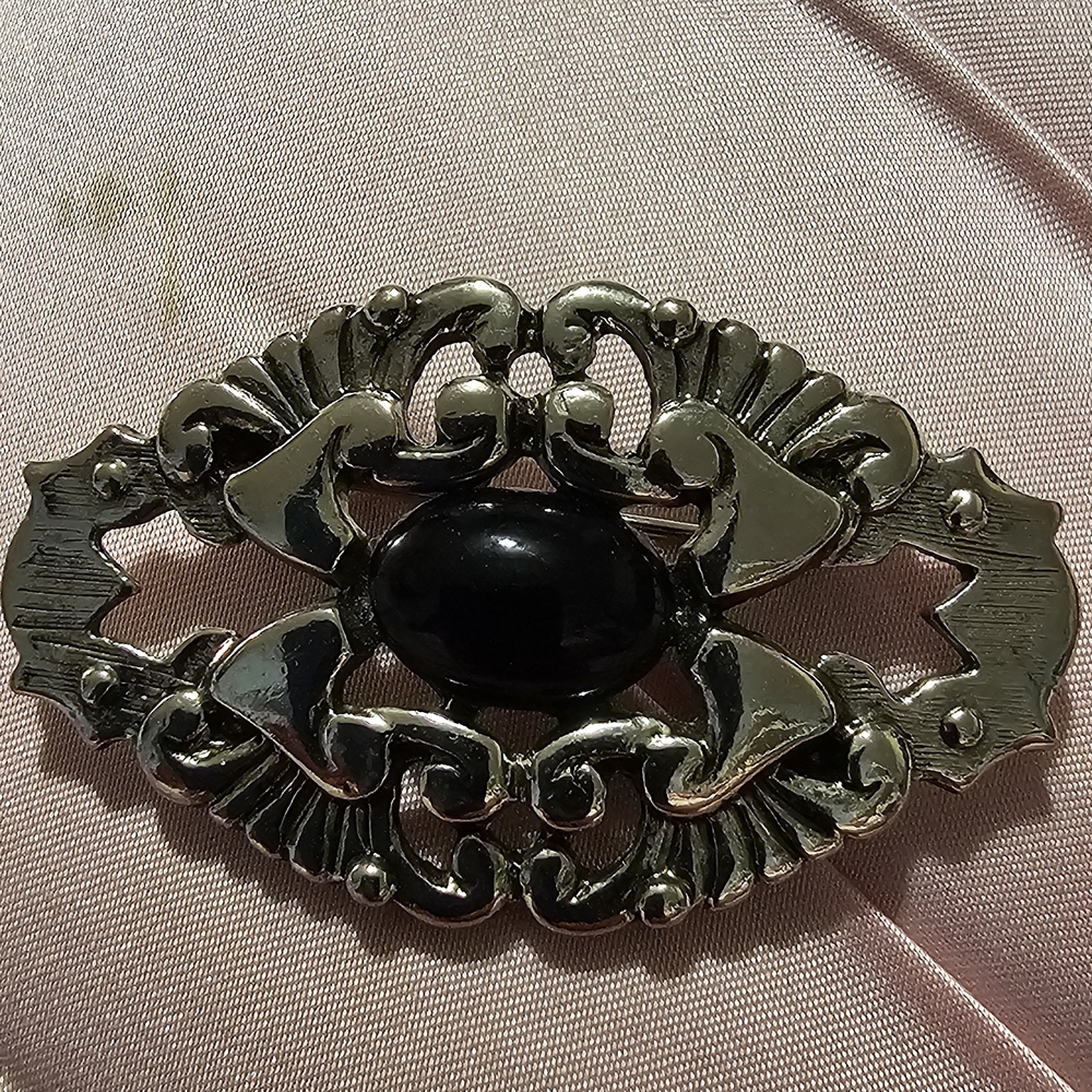 Elegant Silver and Black Brooch 1985